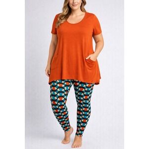 LuLaRoe Womens Leggings Sz TC Snakey Waves Teal Cream Orange Stained Glass